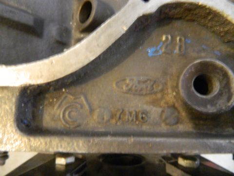 1979 Ford Bronco - Ford engine block casting shows "Ford" logo and "7M8" part number.