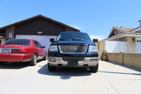 2003 Ford Expedition - Front view of a 2003 Ford Expedition parked in a driveway.