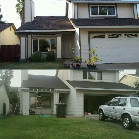 1989 Ford Bronco - A silver SUV is parked in the garage of a suburban house.