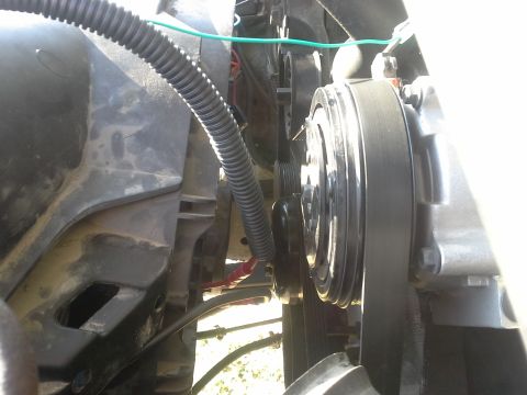 1991 Ford F-250 - Focus on the serpentine belt and pulleys, showing engine mechanics.