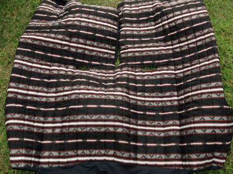 1979 Ford Bronco - These seat covers feature a distinctive striped pattern with red, white, and gray accents.