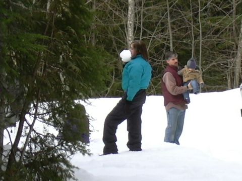 1991 Ford Bronco - A family enjoys a snowy day outdoors.