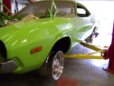 1974 Dodge Challenger - 1974 Dodge Challenger undergoing front suspension work on a car lift.