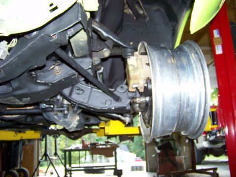 1974 Dodge Challenger - Underside view of a vehicle's front suspension system and wheel assembly.