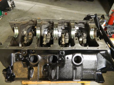 1979 Ford Bronco - Engine block with crankshaft and connecting rods exposed, showing internal mechanical components.