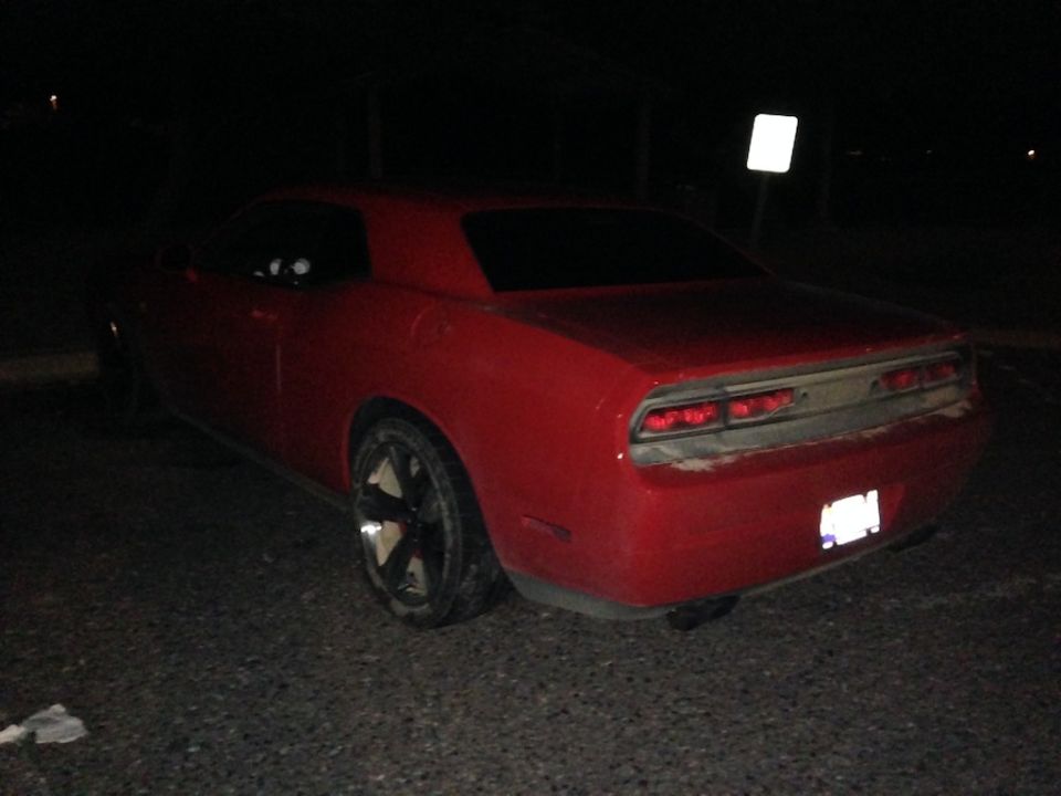 Red Dodge Challenger rear view