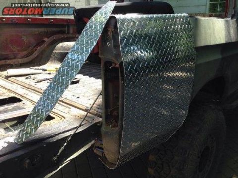 1979 Ford Bronco - Diamond plate trim piece on a pickup truck bed.