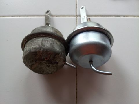 1976 Ford Ranchero - Comparison of a worn vacuum actuator next to a newly restored one.