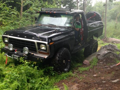1979 Ford Bronco - This 1979 Ford Bronco navigates a rocky trail, its off-road capabilities.