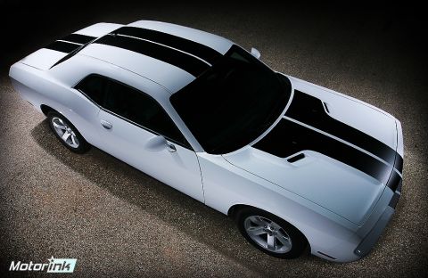 2015 Dodge Challenger - 2015 Dodge Challenger with black racing stripes from a high-angle view.