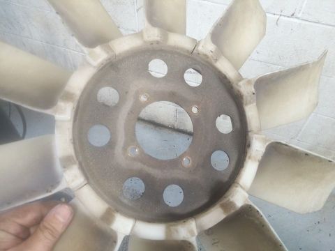 2000 Mercury Grand Marquis - Radiator fan blade, likely from an older vehicle, showing signs of wear.