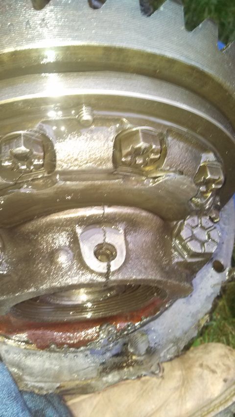 1979 Ford Bronco - This is a close-up view of a vehicle's differential gear assembly, showing internal components and fasteners.
