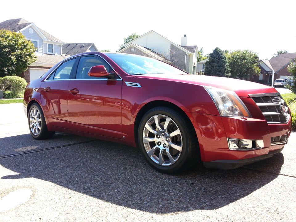 Red 2008 Cadillac CTS 3q-front view