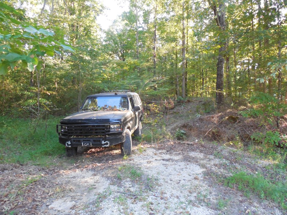 This entrance used to stop right behind the truck; the realtor told me "they built a driveway about 15' off the road."  It's now about a quarter mile long.