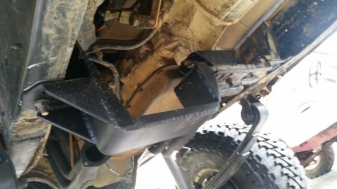 1988 Ford Bronco - Aftermarket skid plates are visible on the undercarriage of this vehicle, obscuring specific year identification.