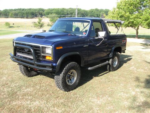 1982 Ford Bronco - This Ford Bronco features a custom hood scoop and a front bull bar with an LED light strip.