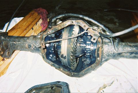 1983 Ford Bronco - Close-up view of an open differential axle assembly, revealing the gears and housing.