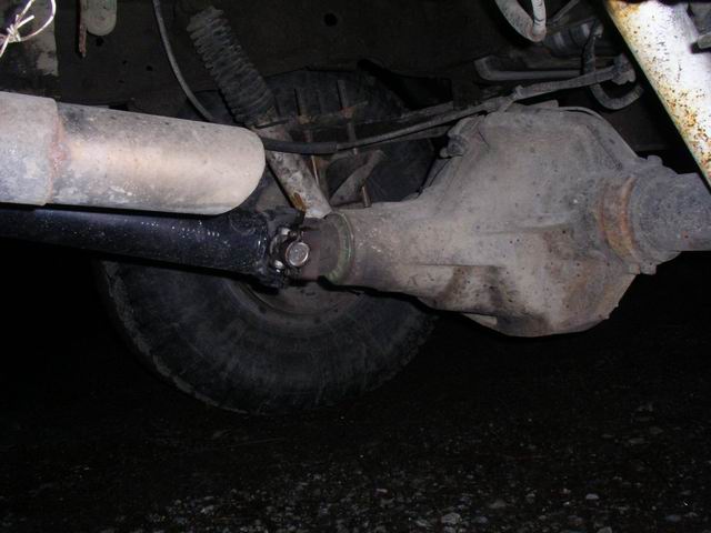 Rear axle, driveshaft, and tire of a truck