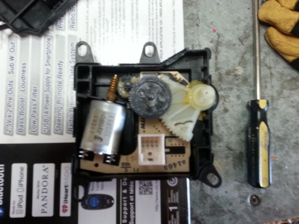 Old blend door actuator (BDA) this one was throwing a code 024, so it was shot.