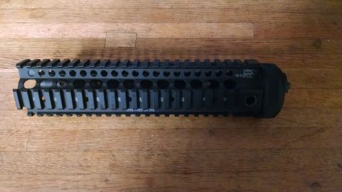 1996 Ford Bronco - Black AR-15 handguard rail system with rail position markings visible.