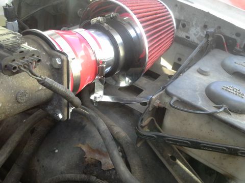 1996 Ford Bronco - Universal bracket in the kit. I used the existing air box screw and bent a 90 degree in the bracket to fit