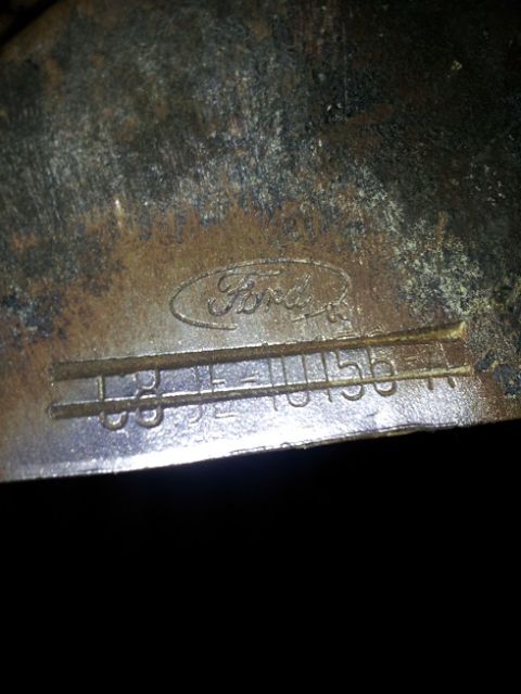 1968 Ford Mustang - Close-up of a Ford part showing casting numbers C8ZE-10156-A.