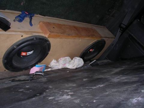 1990 Ford F-150 - A custom subwoofer box with JBL speakers is installed in the interior of a vehicle.