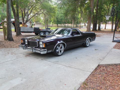 1979 Ford Ranchero - This 1979 Ford Ranchero features a custom hood scoop and shiny chrome wheels, parked in a driveway with trees and a basketball hoop in the…