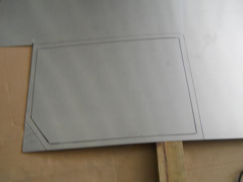 1992 Ford Bronco - Metal panel with scribe lines indicating a cut-out for an access door or panel.
