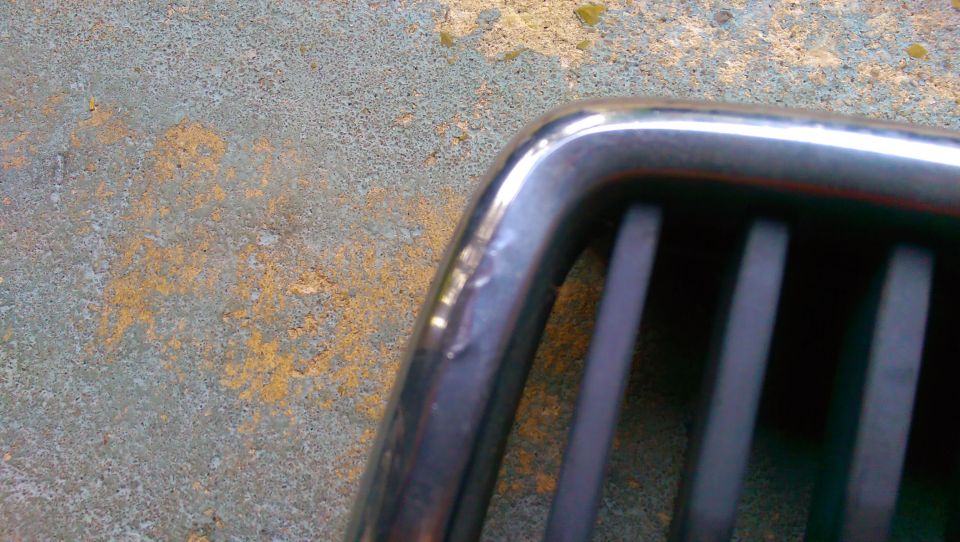 Chrome grille detail with vertical slats