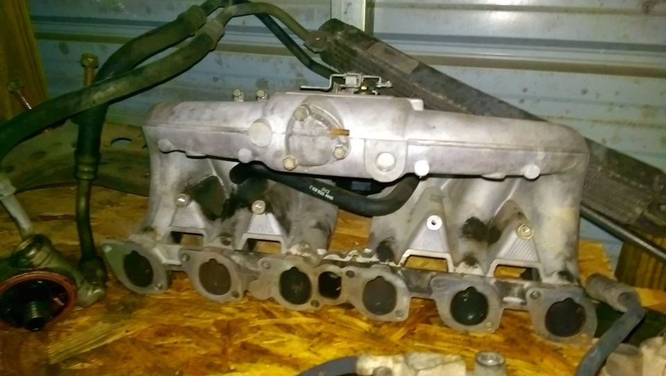 Intake manifold with hoses attached