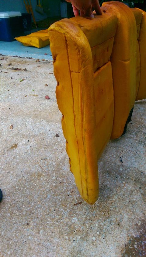 1989 BMW 3 Series - Close-up of yellow car seat foam, possibly removed for repair or replacement.