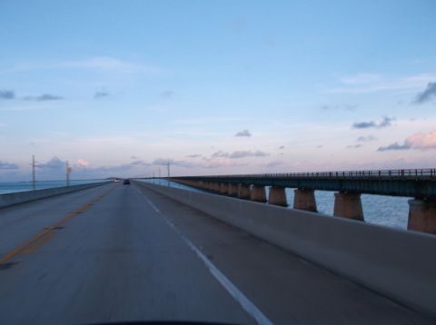 2011 Harley-Davidson Elec Gld Police - Driving on a long bridge over the water during twilight.
