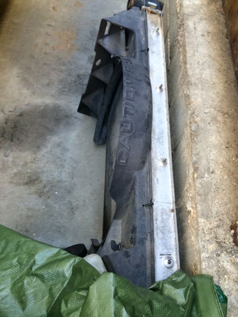 1997 Dodge 3500 - Radiator fan shroud with 'CAUTION' text is shown next to a radiator.