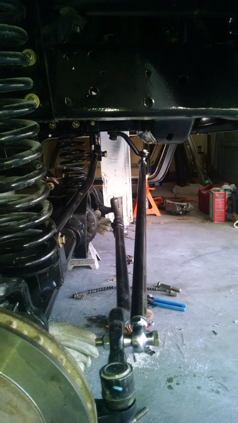 1979 Ford Bronco - Underbody view of suspension and steering parts, possibly during a repair or upgrade.