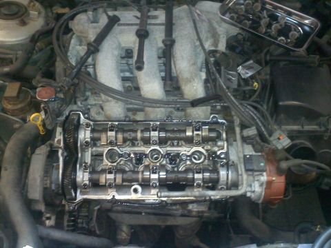 1993 Ford Probe - Close-up view of an engine's internal components with the valve cover removed.