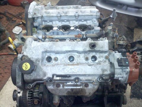 1993 Ford Probe - Engine block with Ford logo visible, likely from a Ford vehicle.