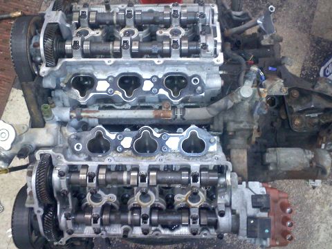 1993 Ford Probe - Engine block with camshafts exposed, likely during a repair or rebuild process.