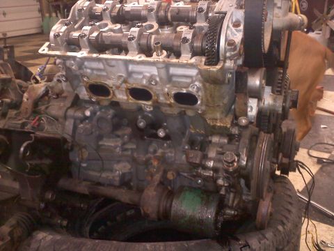 1993 Ford Probe - Close-up view of a disassembled engine, showing internal components and mechanical parts.