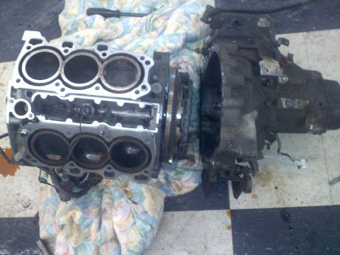 1993 Ford Probe - Engine block and transmission assembly, likely removed for repair or replacement.