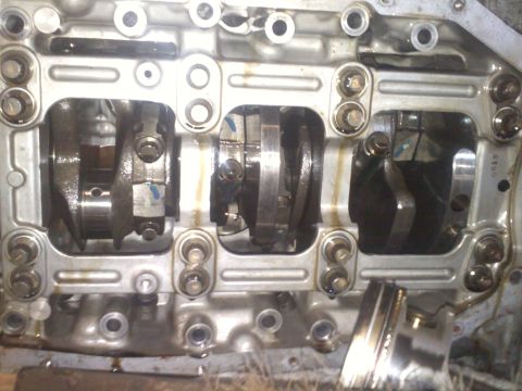1993 Ford Probe - Close-up view of an engine's internal components, showing the crankshaft and connecting rods.