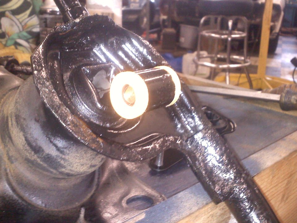 Suspension part with white bushing