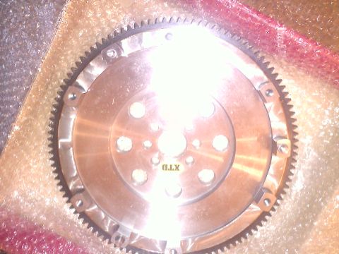 1993 Ford Probe - A metal flywheel part is shown, not a 1993 Ford Probe.