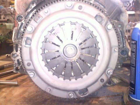 1993 Ford Probe - Close-up of a vehicle's clutch and flywheel assembly.