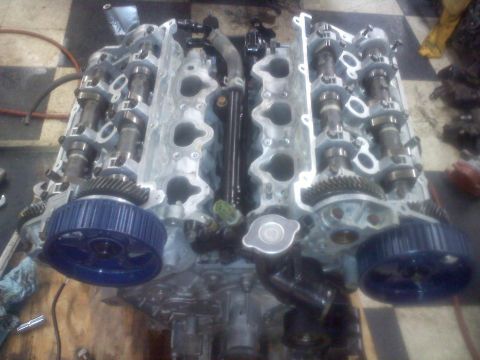1993 Ford Probe - Engine block assembly showing camshafts and timing gears, likely undergoing maintenance or rebuild.