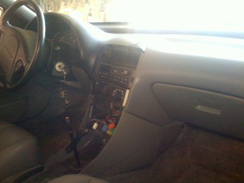 1993 Ford Probe - Interior view of a 1993 Ford Probe GT, highlighting the dashboard and driver's side controls.