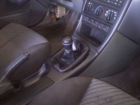 1993 Ford Probe - Interior view of a 1993 Ford Probe, highlighting the manual transmission shifter and handbrake.