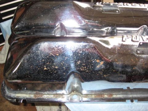 1963 Ford Galaxie - Pair of chrome Ford valve covers, showing "FORD" lettering, likely for a classic Ford engine.
