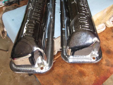 1963 Ford Galaxie - Close-up view of two shiny chrome valve covers, likely for an engine rebuild or upgrade.