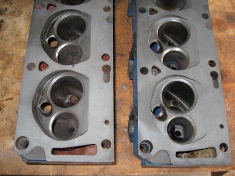 1963 Ford Galaxie - Close-up view of two engine cylinder heads, likely for a V8 engine.